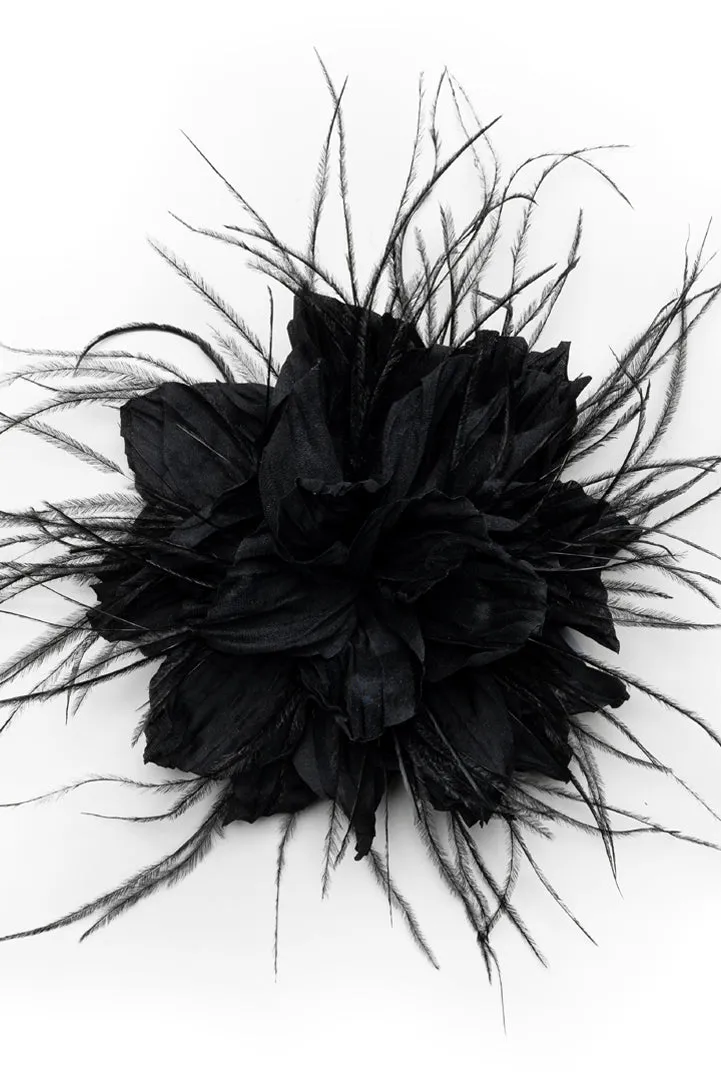 Xenia flower brooch with feathers